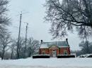 A winter snow storm blankets the campus of ARRL The National Association for Amateur Radio, including the Maxim Memorial Station, W1AW. [Bob Inderbitzen, NQ1R, photo]